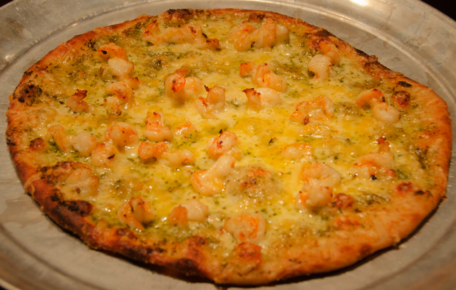 A thin crust pesto and shrimp pizza  was the next course.