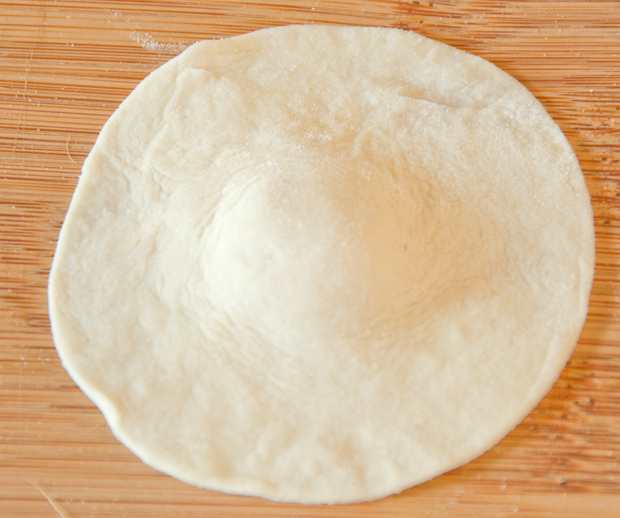 Round of dough with the "belly button".
