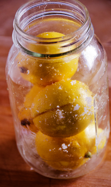 Pack the lemons in a sterilized quart jar. Add any additional seasonings at this time.